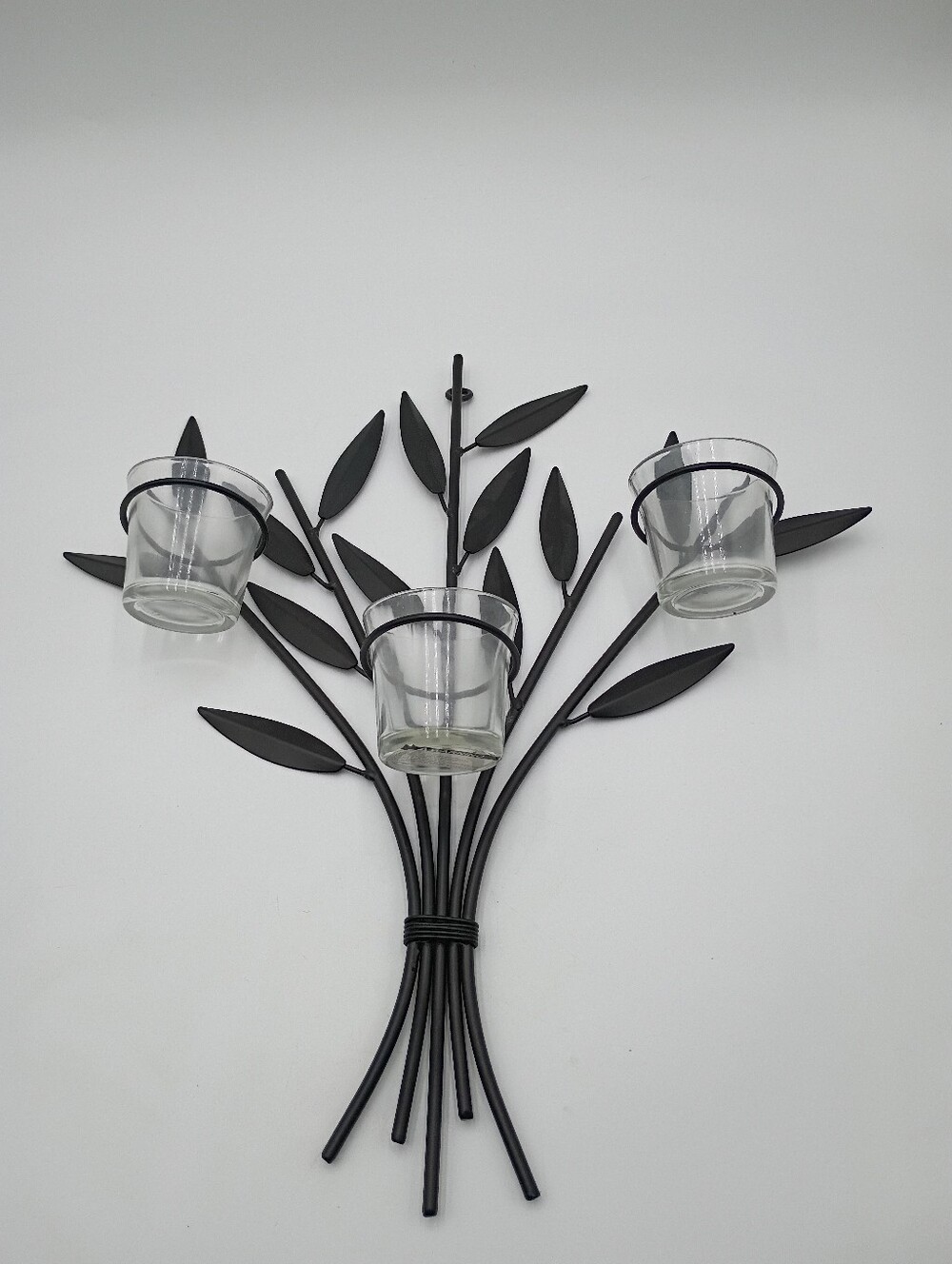Metal wall sconce. With 3 glass tea light candle holders.